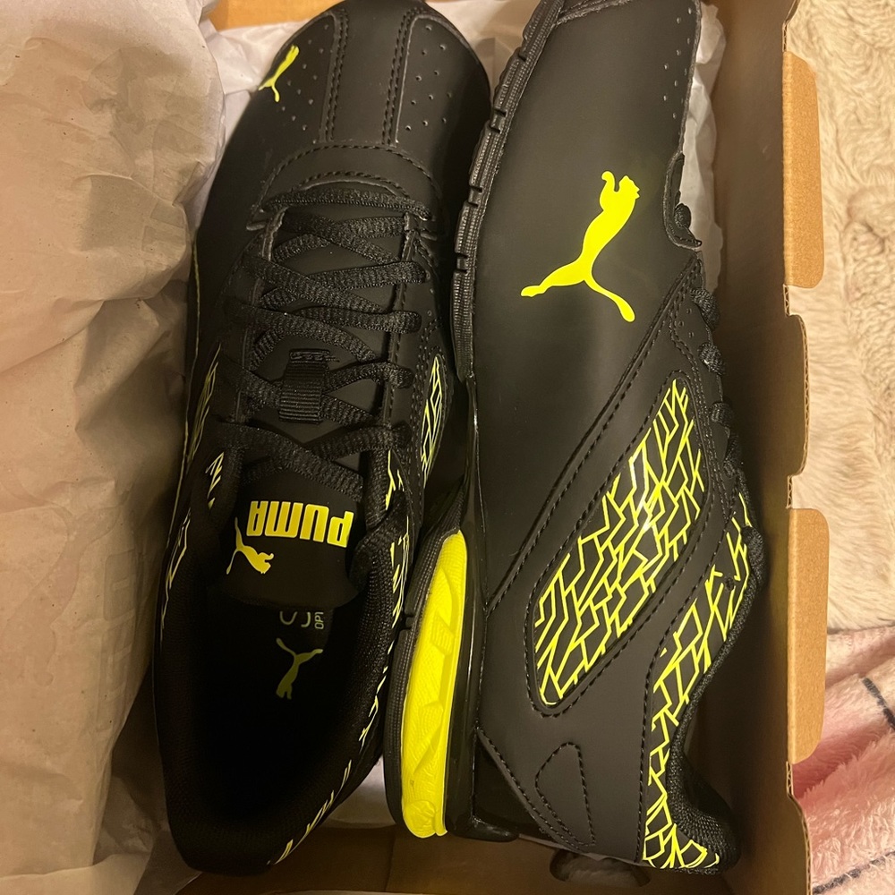 Brand new never worn puma boys shoes! Black and neon green